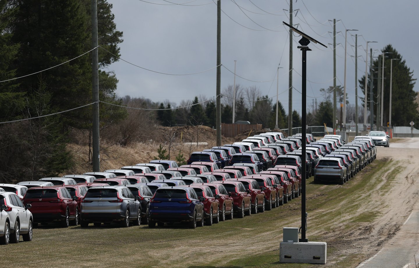 ALLISTON, ON- APRIL 15  -   Cars sit in a lot near the Honda Plant in Alliston. Japan&#039;s Nikkei financial newspaper reported earlier Tuesday that Honda is looking to shift enough Canadian CR-V and Civic production to the U.S. so that it can meet 90 per cent of U.S. sales with vehicles produced there, up from its current level of about 70 per cent.in Alliston. April 15, 2025. Honda shot down those reports it&#039;s moving some auto production to U.S. from Canada. &quot;We can confirm that our Canadian manufacturing facility in Alliston, Ontario, will operate at full capacity for the foreseeable future and no changes are being considered at this time,&quot; the company said Tuesday. Steve Russell/Toronto Star        (Steve Russell/Toronto Star via Getty Images)